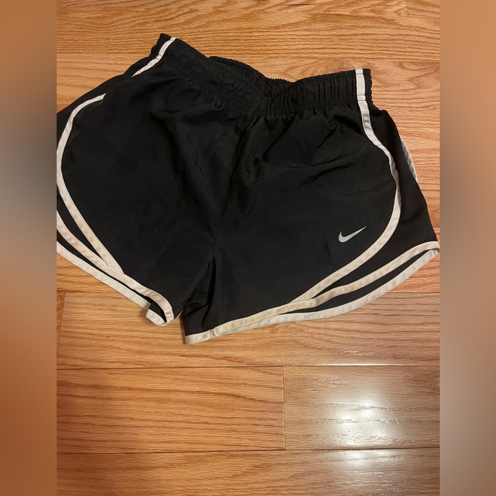 black with white lining nike shorts